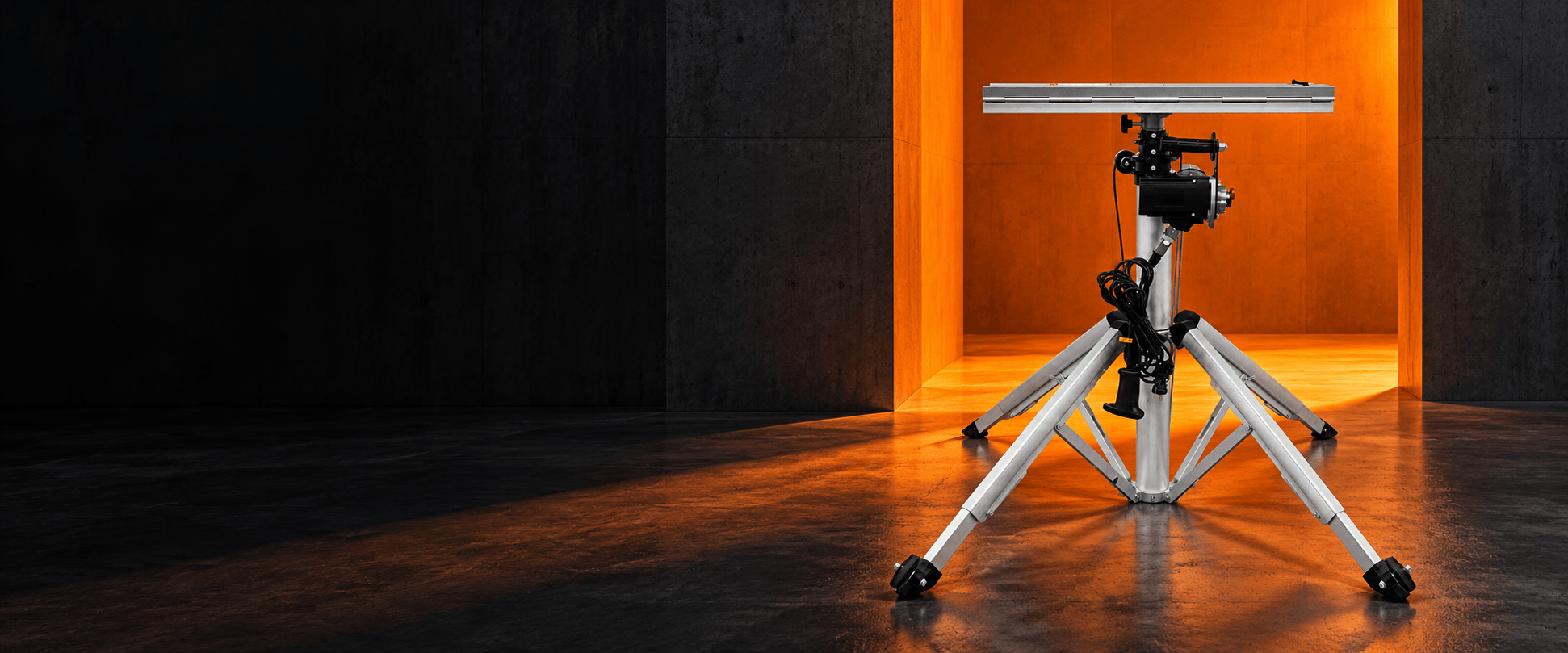 Portable Kovalti lifting system in a dark industrial setting